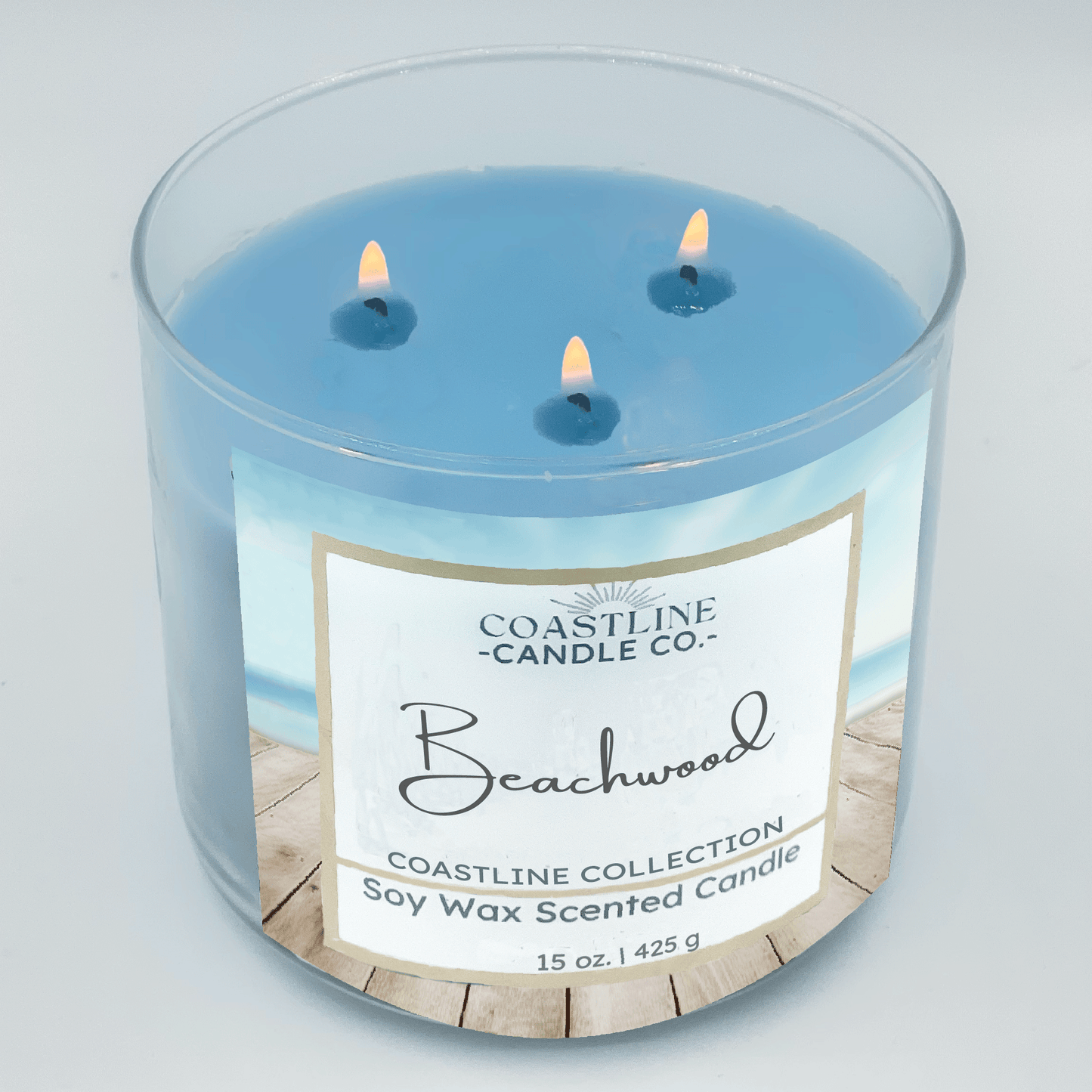 Beachwood Soy Wax Candle - Coastline Collection in 15 oz., 3 wick Clear Jar with blue wax