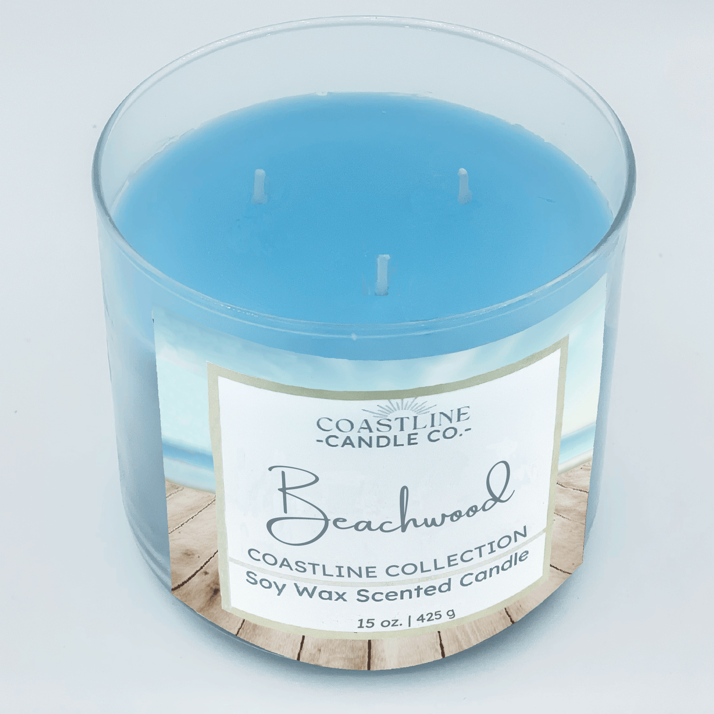 Beachwood Soy Wax Candle - Coastline Collection in 15 oz., 3 wick Clear Jar with blue wax