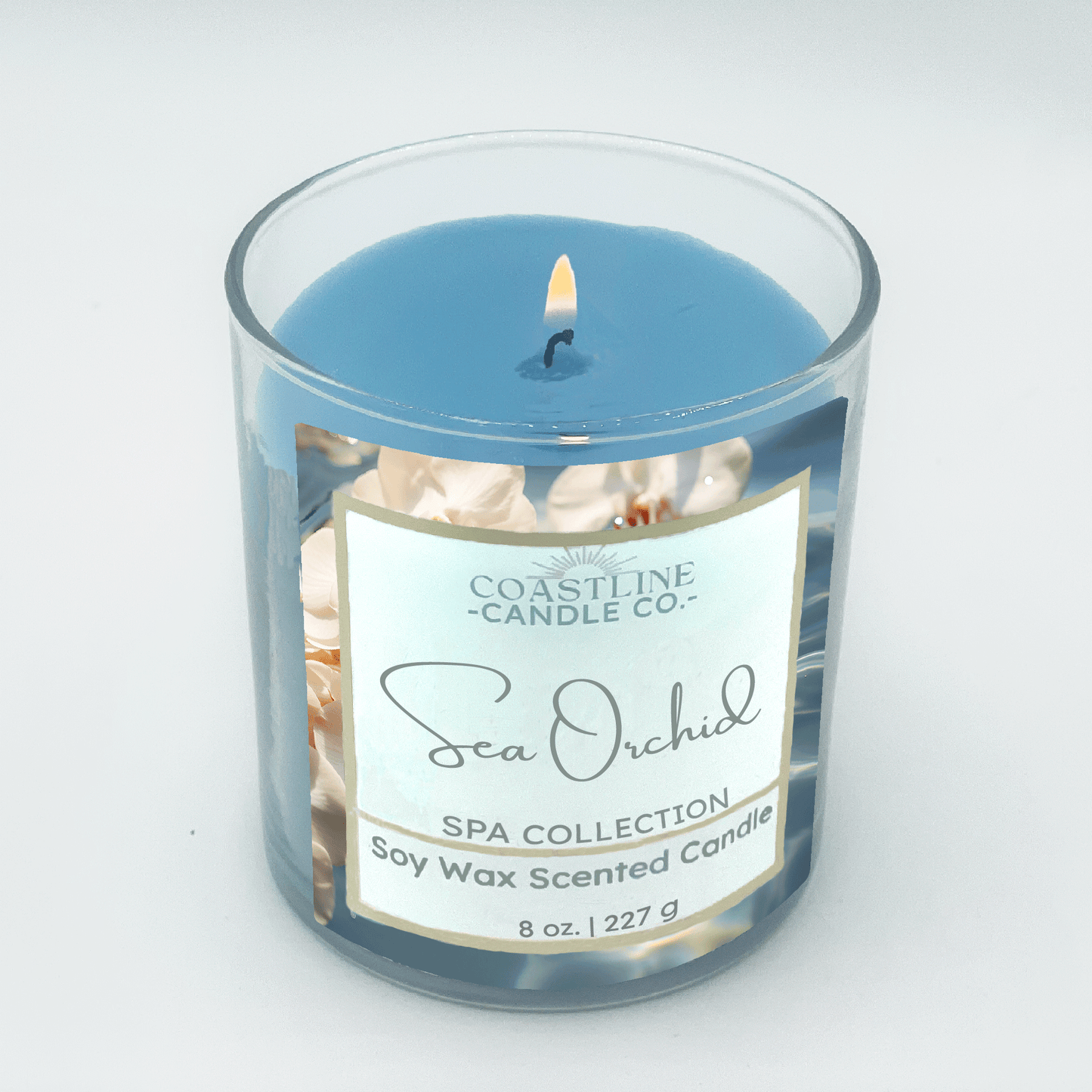 Sea Orchid Soy Wax Candle - Spa Collection in 8 oz. clear jar with blue wax